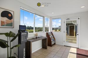 a view from the entrance of a building with a window at Gateway Lodge in Seaside