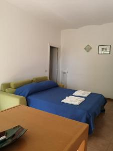 Ένα ή περισσότερα κρεβάτια σε δωμάτιο στο xx settembre House in the city with Garden