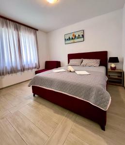 Postel nebo postele na pokoji v ubytování Guesthouse Civovic