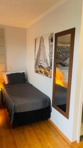Łóżko lub łóżka w pokoju w obiekcie Flat de Luxo Aeroporto Congonhas - Hotel eSuites