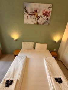Ein Bett oder Betten in einem Zimmer der Unterkunft Stadtoase im Herzen Berlins