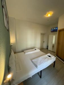 Ein Bett oder Betten in einem Zimmer der Unterkunft Stadtoase im Herzen Berlins