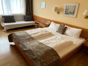 Voodi või voodid majutusasutuse Hotel Zum Kaffeekännchen toas