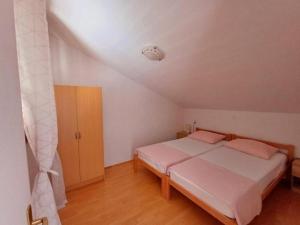 Postel nebo postele na pokoji v ubytování Apartments with parking space Komiza, Vis - 22657