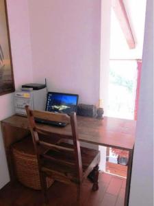 a desk with a laptop computer on top of it at Seaside holiday house Podaca, Makarska - 22964 in Podaca