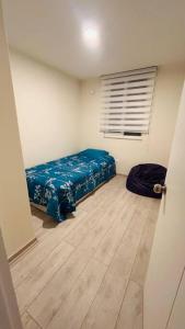 Postel nebo postele na pokoji v ubytování Full equipado 2D+2B a pasos Hospital Regional Rancagua