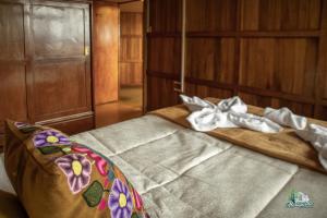 Voodi või voodid majutusasutuse WARM AND CENTRAL HOUSE WITH SPECTACULAR VIEW OF CUSCO toas