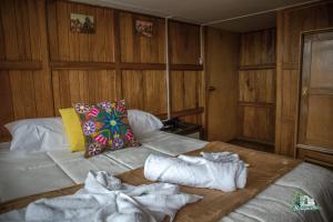 Voodi või voodid majutusasutuse WARM AND CENTRAL HOUSE WITH SPECTACULAR VIEW OF CUSCO toas