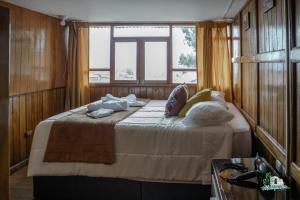 Voodi või voodid majutusasutuse WARM AND CENTRAL HOUSE WITH SPECTACULAR VIEW OF CUSCO toas