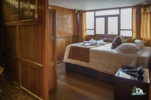 Voodi või voodid majutusasutuse WARM AND CENTRAL HOUSE WITH SPECTACULAR VIEW OF CUSCO toas