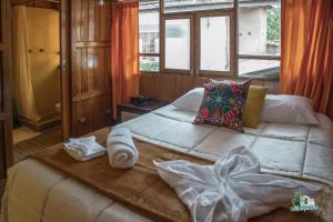 Voodi või voodid majutusasutuse WARM AND CENTRAL HOUSE WITH SPECTACULAR VIEW OF CUSCO toas