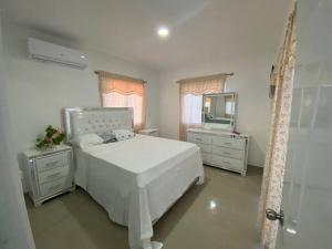 Katil atau katil-katil dalam bilik di Apartamento en Puerto Plata, en Los Maestros