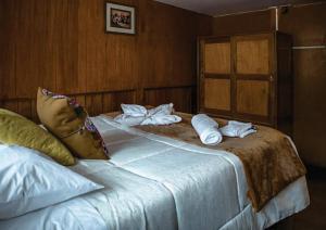 Voodi või voodid majutusasutuse WARM AND CENTRAL HOUSE WITH SPECTACULAR VIEW OF CUSCO toas