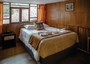 Voodi või voodid majutusasutuse WARM AND CENTRAL HOUSE WITH SPECTACULAR VIEW OF CUSCO toas