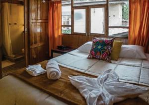 Voodi või voodid majutusasutuse WARM AND CENTRAL HOUSE WITH SPECTACULAR VIEW OF CUSCO toas