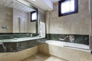 Koupelna v ubytování Borgo Palace Hotel