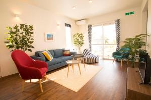 Posezení v ubytování 沖縄屈指のリゾートエリア恩納村の1棟貸し切り別荘へめんそーれ