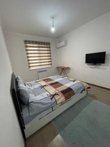 Cama o camas de una habitación en New home 2