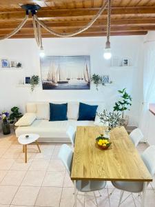 a living room with a couch and a table at Olivier house in Zaglav