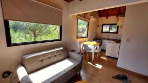 TV a/nebo společenská místnost v ubytování Mansavista Cabañas