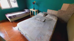 מיטה או מיטות בחדר ב-Hostel Loli