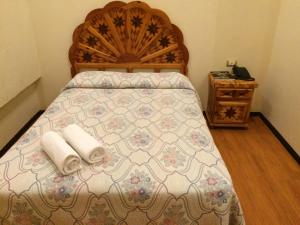 Een bed of bedden in een kamer bij Hotel Estelar