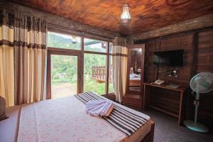 TV a/nebo společenská místnost v ubytování Top Mountain Resort