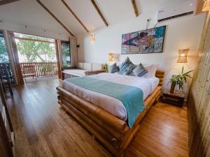 Voodi või voodid majutusasutuse Ecoboo Maldives toas