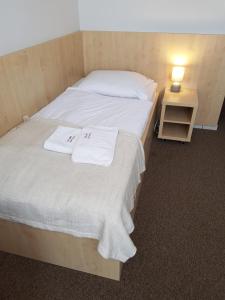 Ένα ή περισσότερα κρεβάτια σε δωμάτιο στο Villa Merry