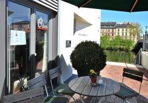 Balkón nebo terasa v ubytování Tandem Hotel