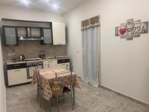 Kuhinja ili čajna kuhinja u objektu Al piccolo borgo Još 14 fotografija