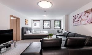 TV a/nebo společenská místnost v ubytování Ostseebad-Karlshagen-gefaellige-Ferienwohnung-Winter