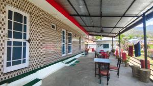 Balkón nebo terasa v ubytování Puri Home Stay Bir Billing