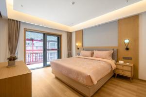 Hunan New Pipaxi Hotel客房内的一张或多张床位
