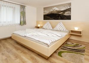 Un pat sau paturi într-o cameră la Roslerhof