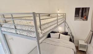 Postel nebo postele na pokoji v ubytování La Cigogne