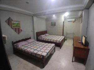 Afbeelding uit fotogalerij van Hotel Pelangi HS in Ngabean