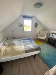 Postel nebo postele na pokoji v ubytování L'Océan, maison avec jardin clos