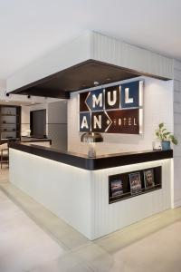 Kuchyň nebo kuchyňský kout v ubytování Mulan Hotel