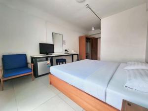 TV a/nebo společenská místnost v ubytování Siam Palace Hotel