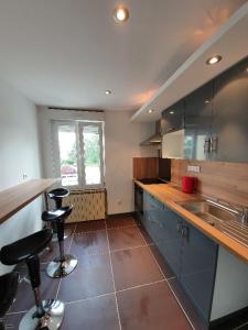 A kitchen or kitchenette at NancyRoom