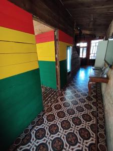 a room with colorful walls and a colorful floor at Chania Hostel Youth in Chania