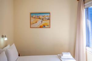Postel nebo postele na pokoji v ubytování Lucia Hotel