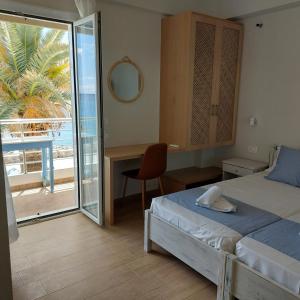 Posteľ alebo postele v izbe v ubytovaní Maria's Hotel