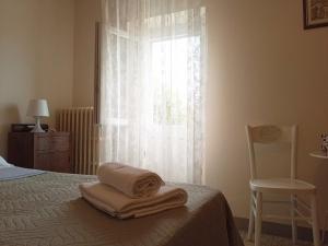 Afbeelding uit fotogalerij van Casa Cairo Rooms&Services in Mombaroccio