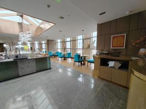 Tuke Hotel Shanghai Hongqiao Center Branch的厨房或小厨房