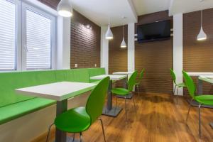 TV a/nebo společenská místnost v ubytování ParkCity rooms