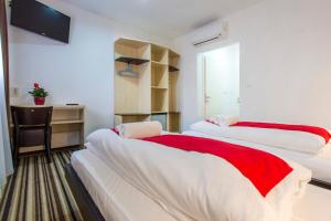Postel nebo postele na pokoji v ubytování ParkCity rooms
