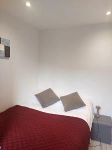 Ένα ή περισσότερα κρεβάτια σε δωμάτιο στο Veroniques Apartment