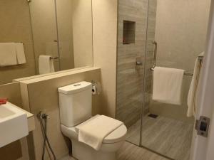 Koupelna v ubytování Windmill Upon Hills Premium Suite By Rapi Stay